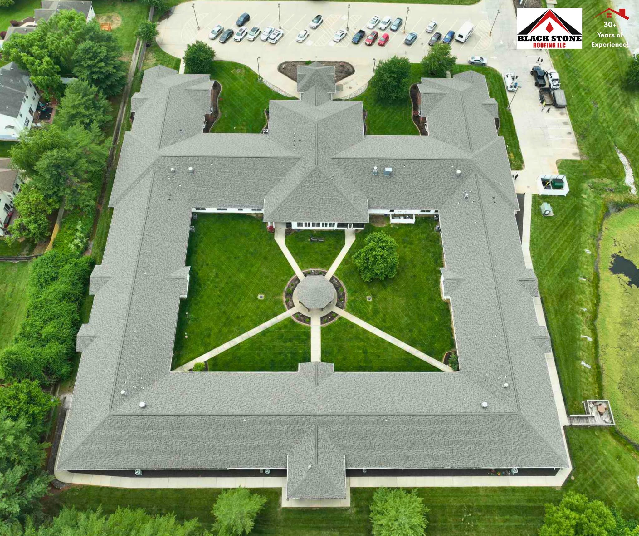 Aerial of a senior living community reroofed with architectural shingles by Black Stone Roofing